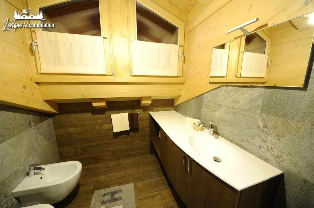 Alpen Flower By Livigno Accomodation Rom bilde